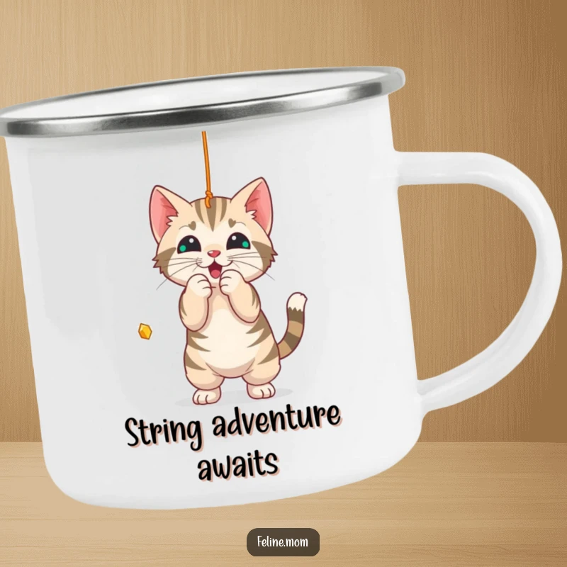 Funny Camping Mug: A playful tabby cat batting at a string, perfect for your outdoor drinks.