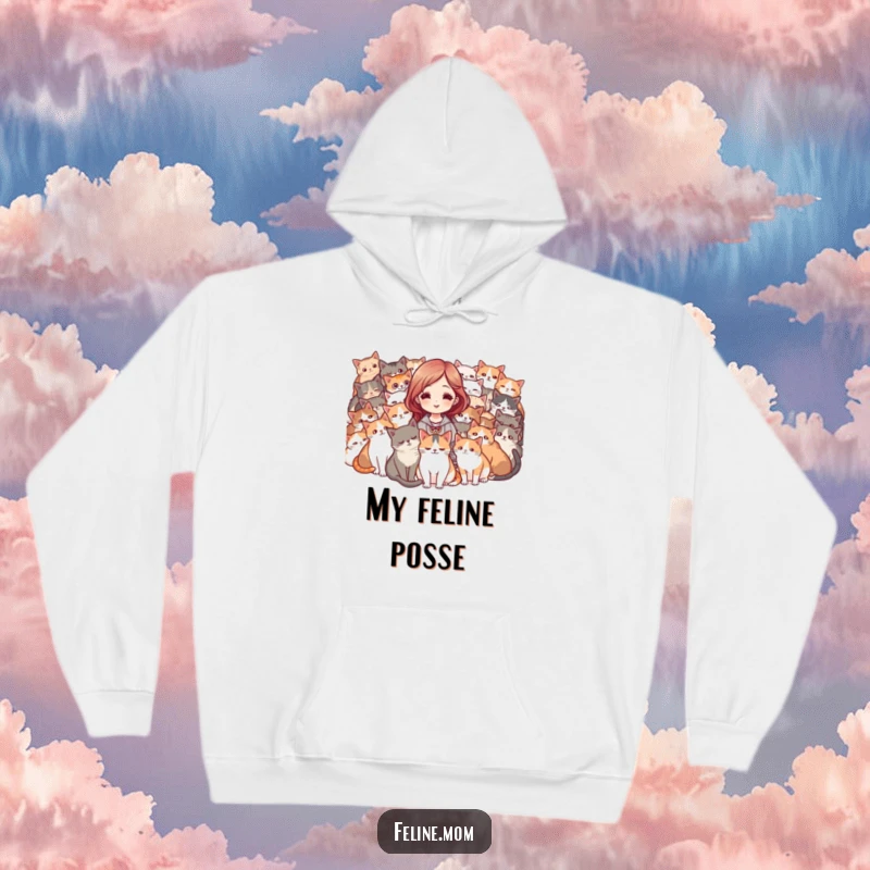 Funny hoodie of a woman surrounded by a purring mob of cats, looking delighted and adored. A humorous cozy gift.