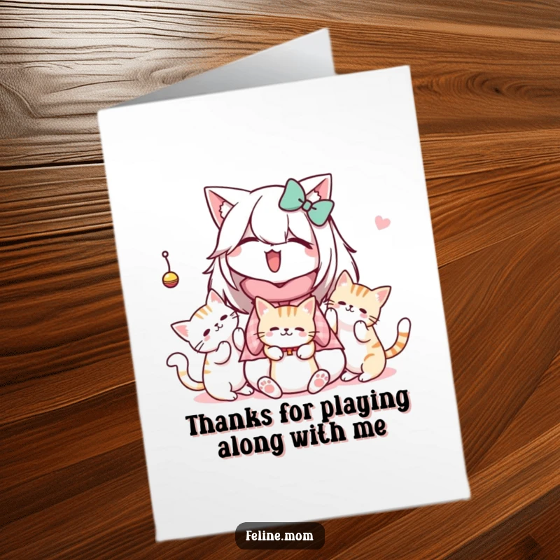Funny free printable thank you card featuring a Kawaii cat lady and cats happily batting at a dangling toy, expressing thanks.