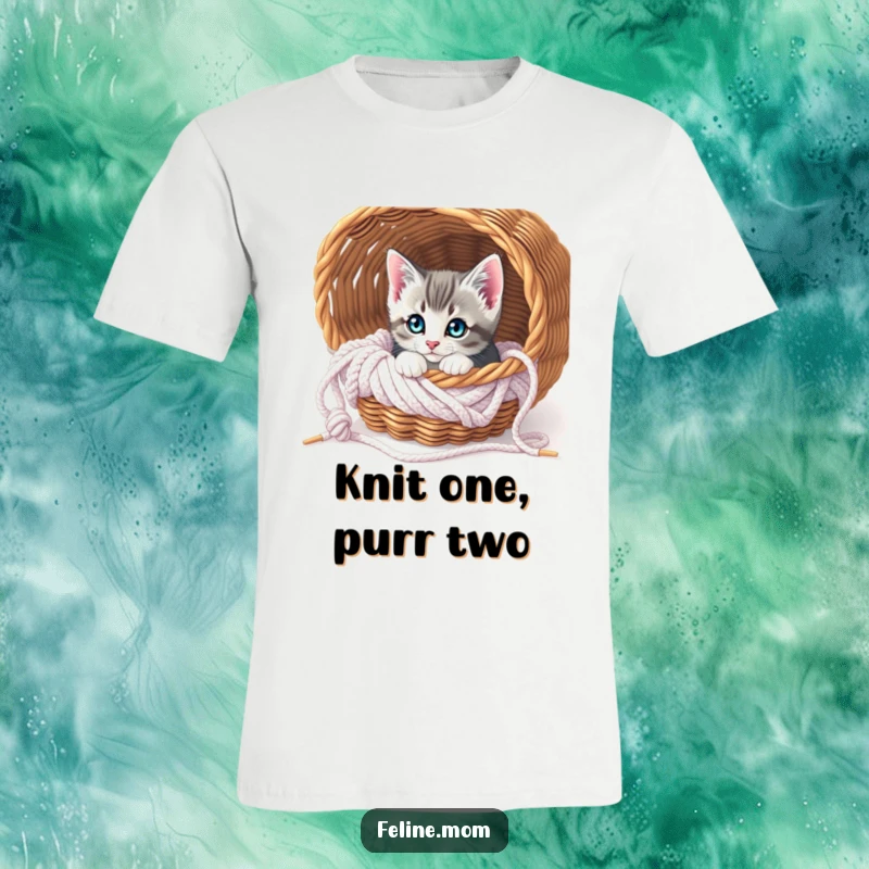 Funny Curious Kitten Knitting T-Shirt: A playful kitten emerges from a knitting basket, its eyes full of curiosity and mischief.