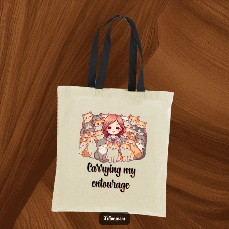 Funny tote bag with a woman surrounded by a purring mob of cats, looking pleased. A humorous and practical accessory.