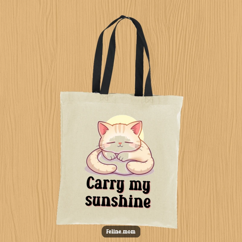 Funny cat tote bag illustration of a contented cat napping peacefully in a sunbeam.
